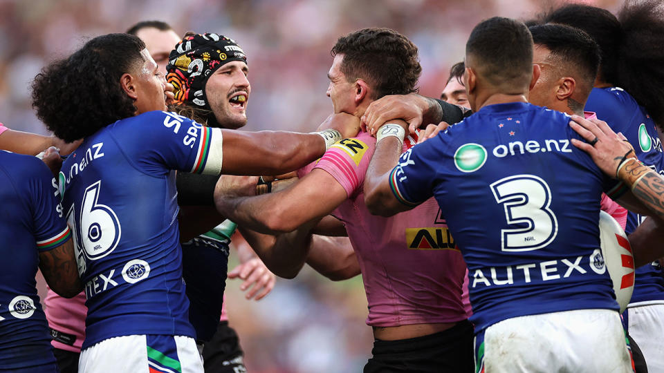 Players from the Warriors and Panthers clash during the round 10 clash for the NRL's Magic Round. Pic: Getty
