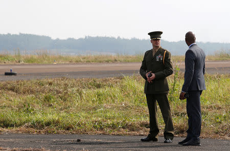 U.S. soldiers stand guard near the dioxin contaminated area while U.S. Secretary of Defense Jim Mattis (not pictured) visits Bien Hoa airbase, where the U.S. army stored the defoliant Agent Orange during the Vietnam War, in Bien Hoa city, outside Ho Chi Minh city, Vietnam October 17, 2018. REUTERS/Kham/Pool