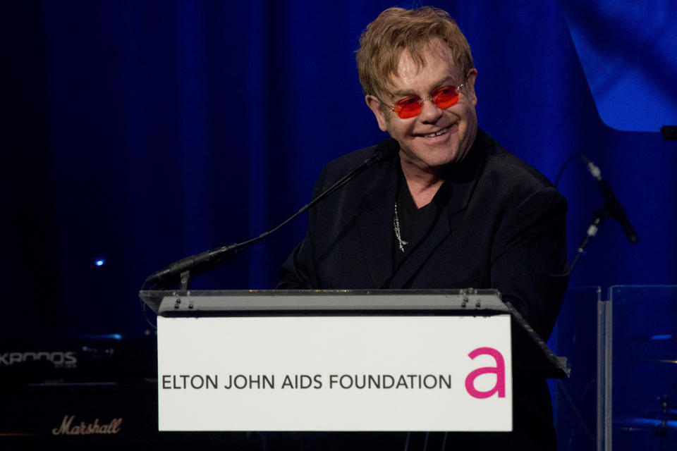 Elton John appears on stage at his AIDS Foundation's 11th annual Enduring Vision benefit on Monday, Oct. 15, 2012 in New York. (Photo by Charles Sykes/Invision/AP)