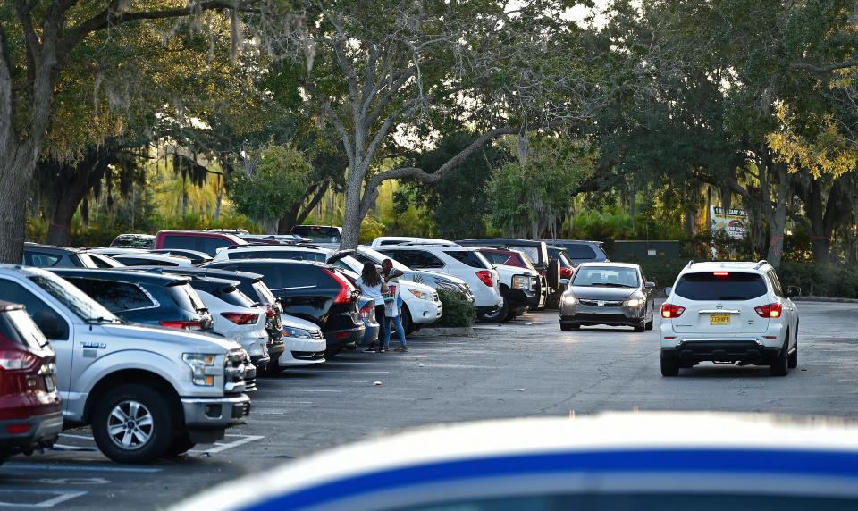 Black Friday's early morning shoppers fill up the parking lot at Ellenton's Premium Outlets in Ellenton.