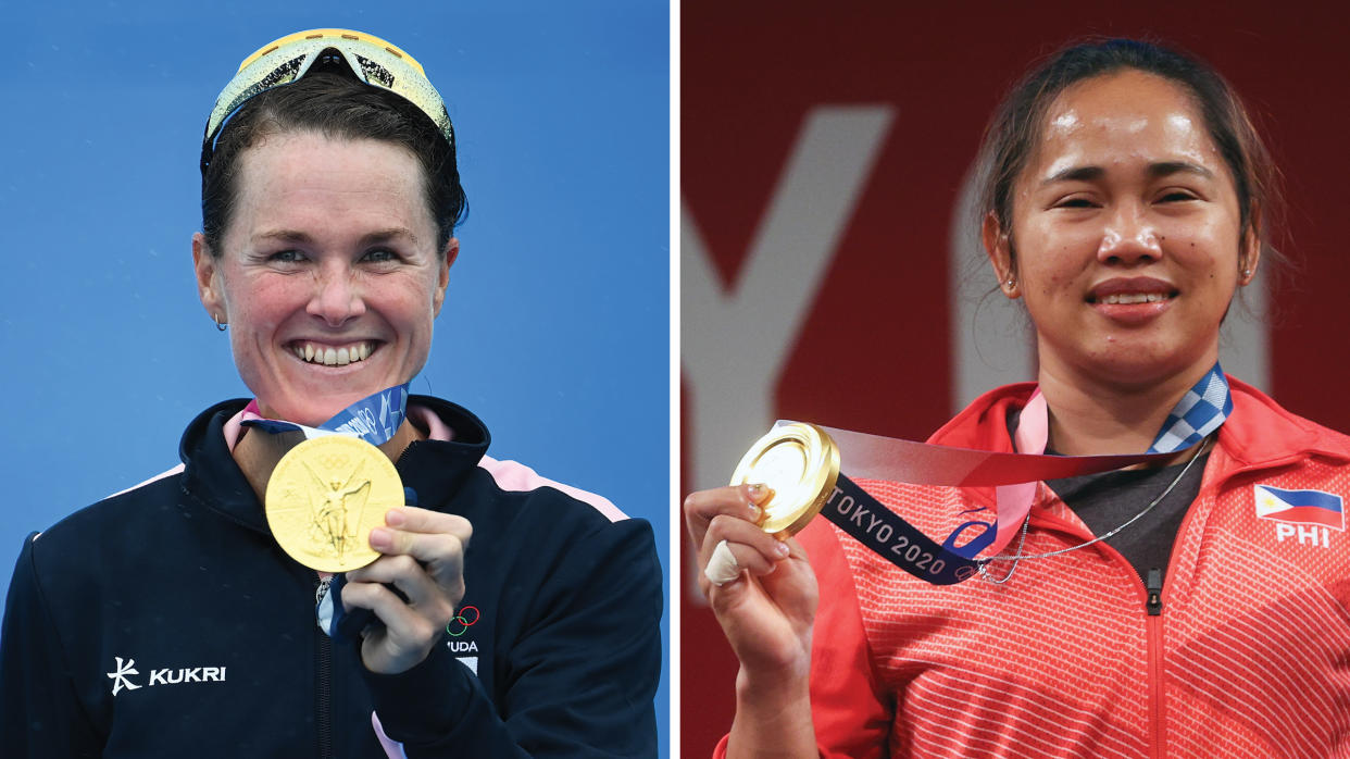 Flora Duffy of Team Bermuda with her gold medal (left) and Hidilyn Diaz of Team Philippines posing with the gold medal.