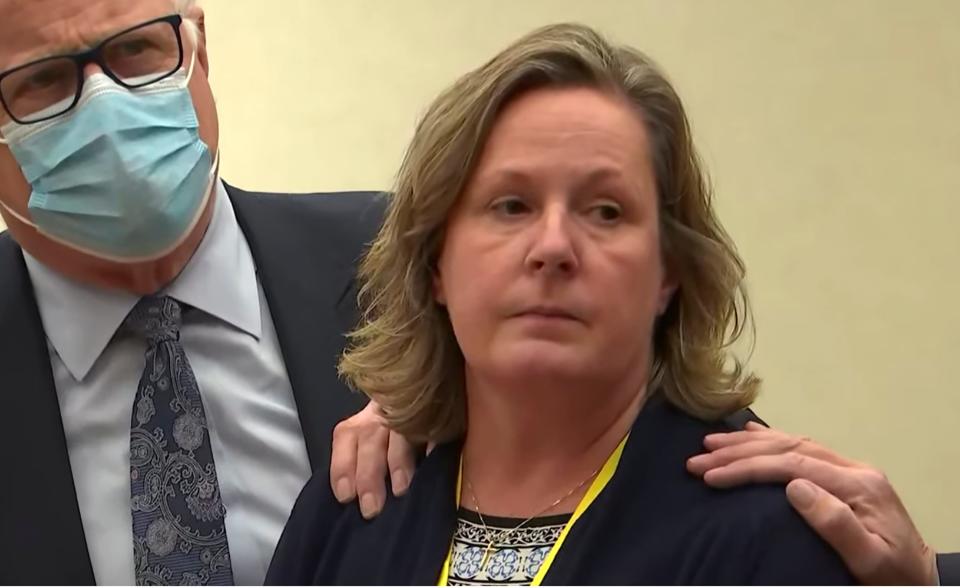 In this screen grab from video, former Brooklyn Center Police Officer Kim Potter stands with defense attorney Earl Gray, as the verdict is read Thursday, Dec.,23, 2021 at the Hennepin County Courthouse in Minneapolis, Minn.