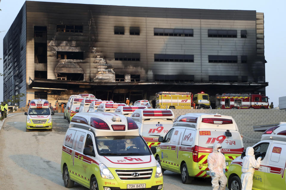 Emergency ambulances carrying victims leave a construction site after a fire in Icheon, South Korea, Wednesday, April 29, 2020. One of the South Korea’s worst fires in years broke out at the construction site. (Hong Ki-won/Yonhap via AP)