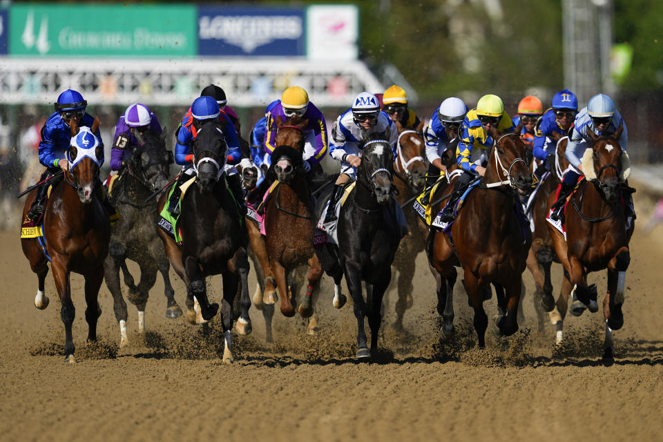 Horses run during the 149th running of the Kentucky Oaks horse race at Churchill Downs Friday, May 5, 2023, in Louisville, Ky. (AP Photo/Julio Cortez)