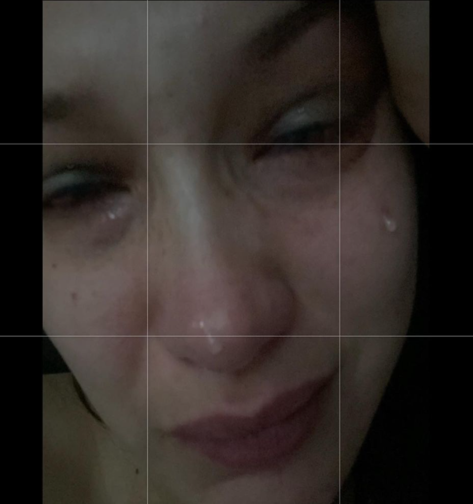 A gridded selfie of Bella crying
