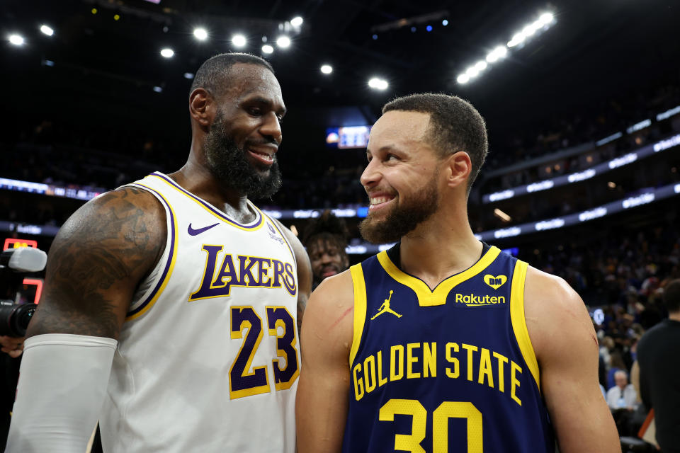 SAN FRANCISCO, CALIFORNIA - JANUARY 27: LeBron James #23 of the Los Angeles Lakers and Stephen Curry #30 of the Golden State Warriors talk to each other after the Lakers beat the Warriors in double overtime at Chase Center on January 27, 2024 in San Francisco, California. NOTE TO USER: User expressly acknowledges and agrees that, by downloading and or using this photograph, User is consenting to the terms and conditions of the Getty Images License Agreement.  (Photo by Ezra Shaw/Getty Images)