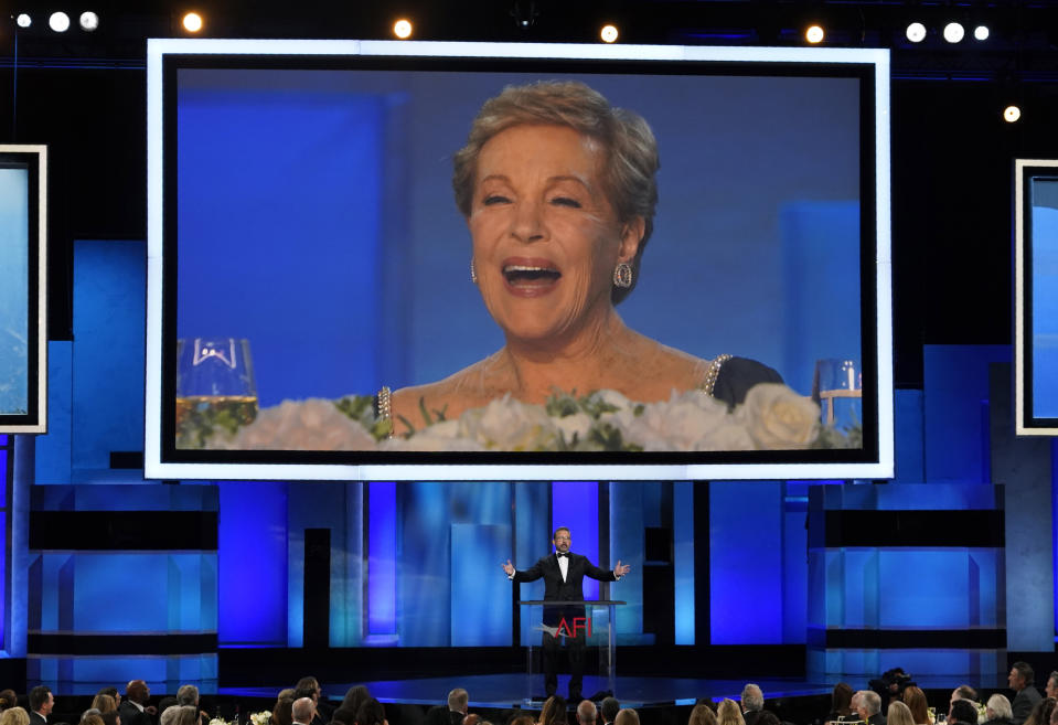 Actor Julie Andrews is seen on a stage monitor reacting to a joke by Steve Carell during the 48th AFI Life Achievement Award Gala honoring her, Thursday, June 9, 2022, at the Dolby Theatre in Los Angeles. (AP Photo/Chris Pizzello)