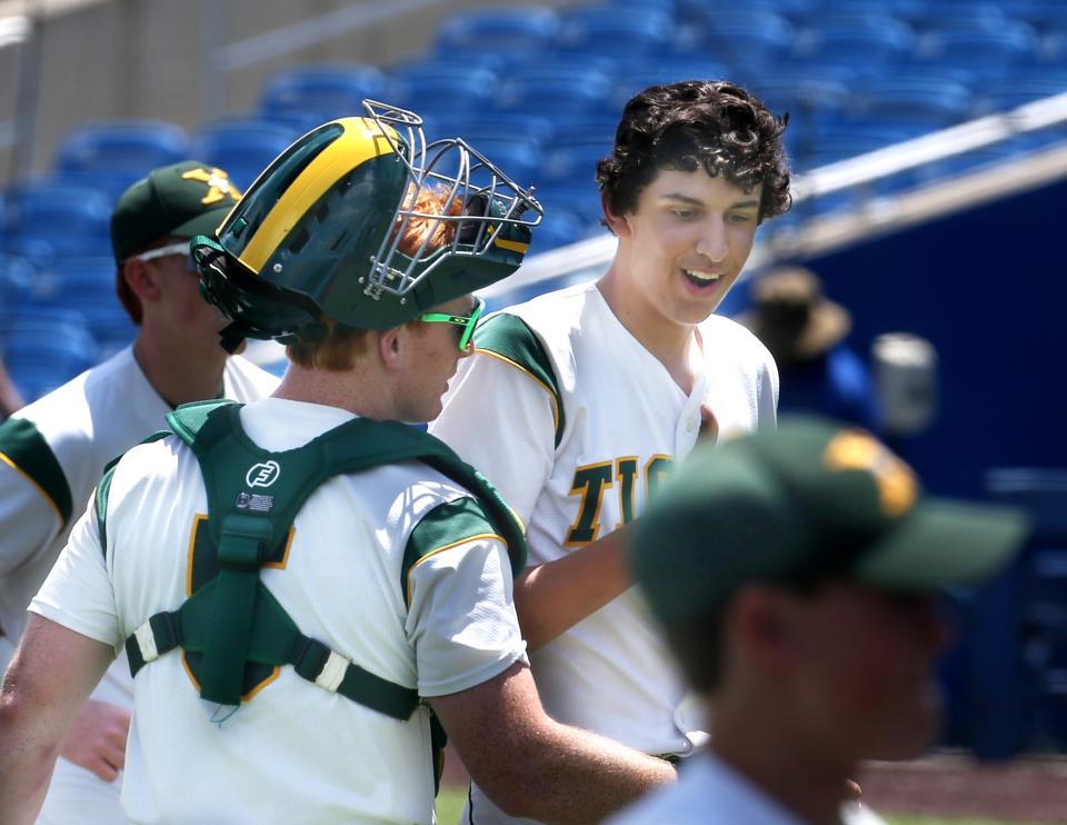 St. X’s Ben Tedesio and Jake Bennett walk off field after the third out against Christian County.June 3, 2022 