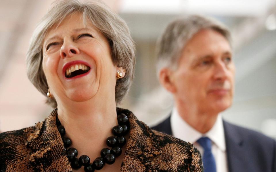 Theresa May and Philip Hammond - Andrew Yates/AFP/Getty Images