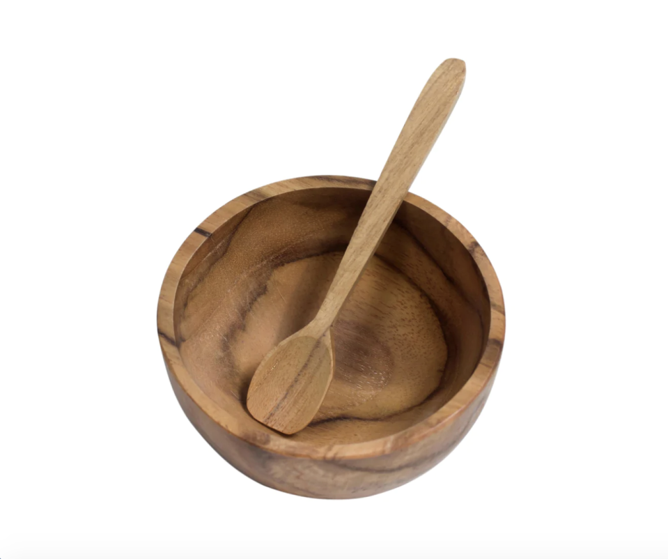 <p>Ceremonia</p><p><strong>$14.00</strong></p><p>Not only is this teak bowl the perfect spot to store your salt, but it's from Ceremonia, a brand started by Latina Carina Santoyo. She works with local Balinese artisans to make home goods. rattan coasters, bamboo cutlery, and linen napkins. </p>