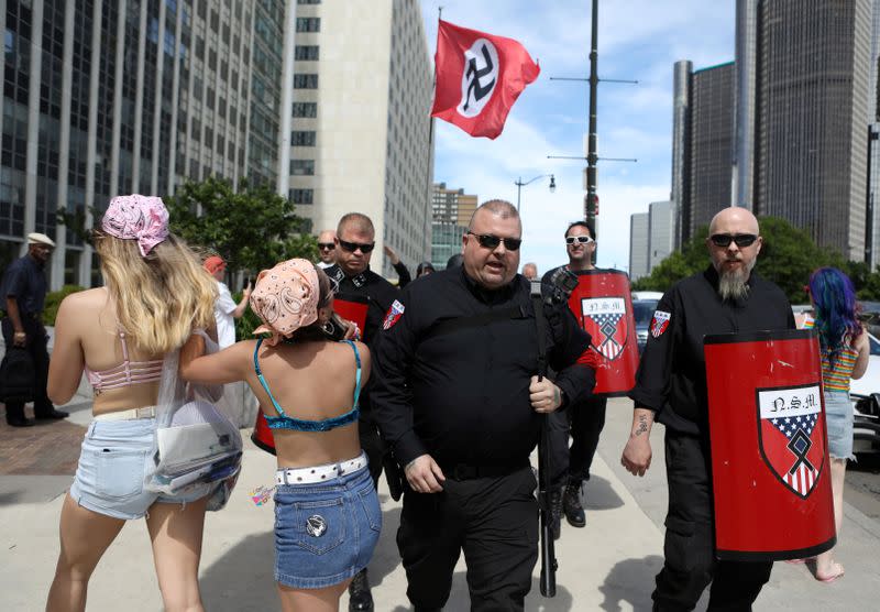 FILE PHOTO: Members of the National Socialist Movement demonstrate against the LGBTQ event Motor City Pride in Detroit