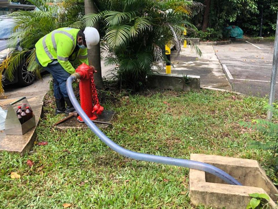 PUB said its officers have been flushing water mains to remove the affected water since noon on Wednesday (22 July). (PHOTO: PUB / Facebook)