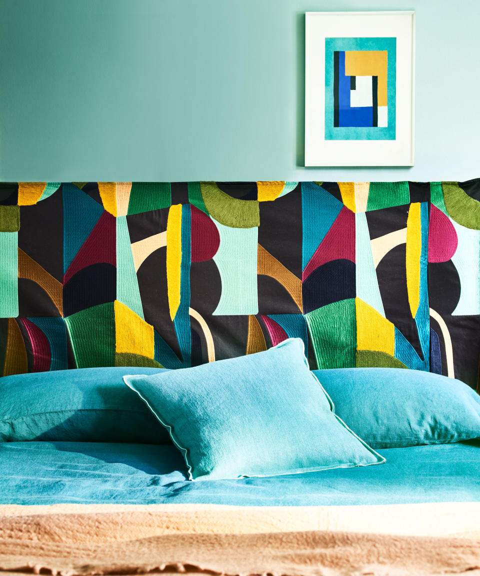 INJECT VIVID COLOR INTO A BEDROOM WITH A BRIGHT HEADBOARD