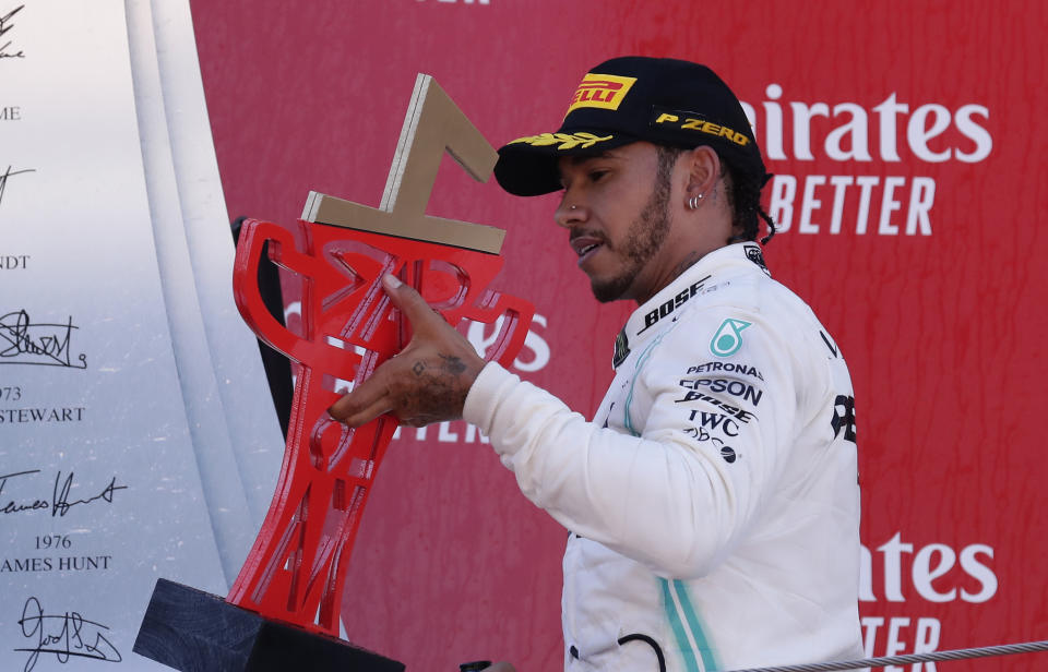 Mercedes driver Lewis Hamilton of Britain celebrates on the podium after winning the Spanish Formula One race at the Barcelona Catalunya racetrack in Montmelo, just outside Barcelona, Spain, Sunday, May 12, 2019. (AP Photo/Manu Fernandez)