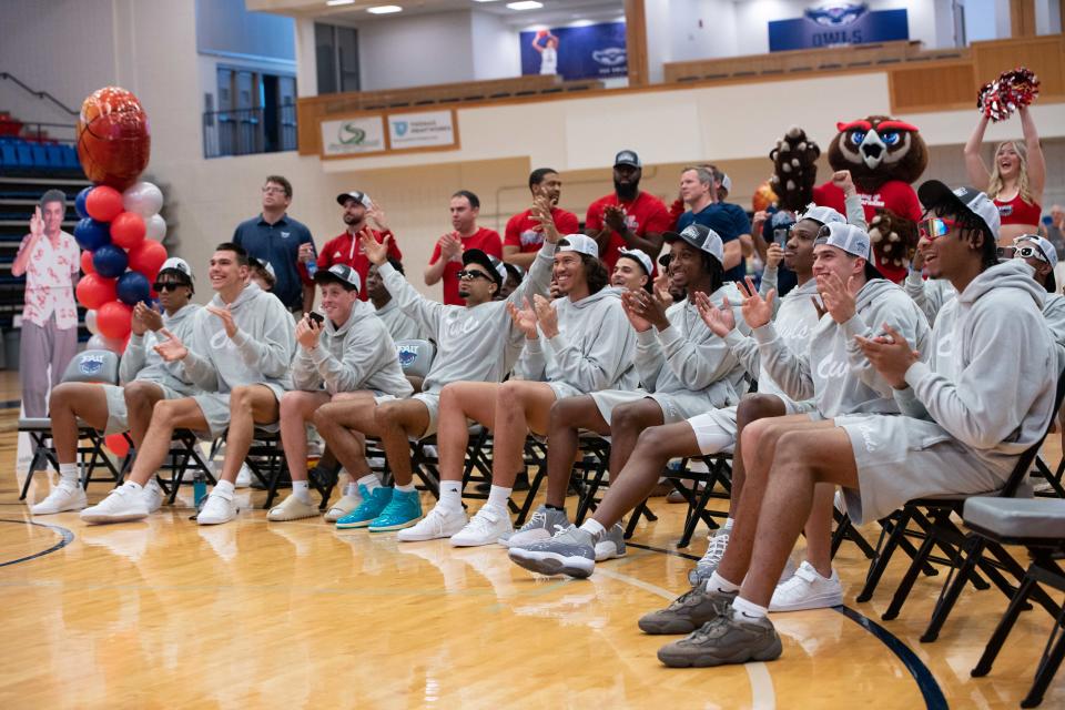 The Florida Atlantic University basketball players and coaches react seeing where they were seeded and who they were playing in the NCAA Tournament during Sunday night's selection show on CBS.