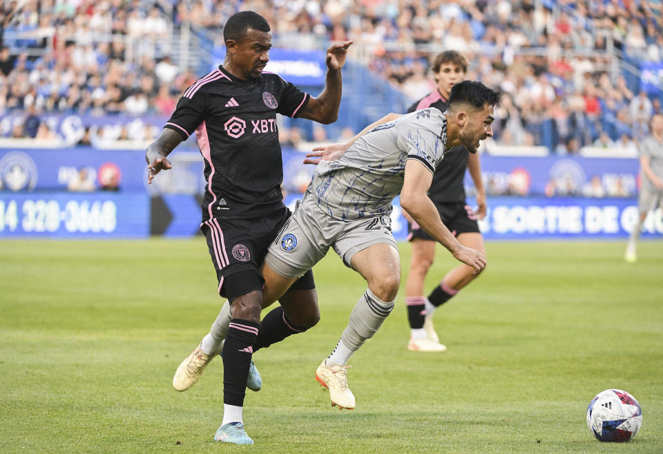 CF Montreal's Mathieu Choiniere, right, is challenged by Inter Miami's Dixon Arroyo during first-half MLS soccer match action in Montreal, Saturday, May 27, 2023. (Graham Hughes/The Canadian Press via AP)