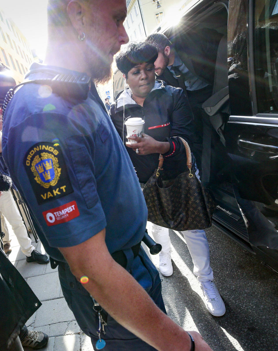 Renee Black, mother of ASAP Rocky, right, arrives at the district court in Stockholm, Thursday Aug. 1, 2019. American rapper A$AP Rocky pleaded not guilty to assault as his trial in Sweden opened Tuesday, a month after a street fight that landed him in jail and became a topic of U.S.-Swedish diplomacy. (Fredrik Persson/TT News Agency via AP)