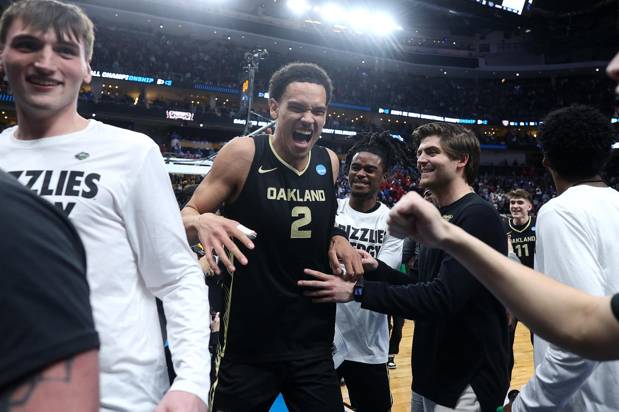 PITTSBURGH, PENNSYLVANIA - MARCH 21: Chris Conway #2 of the Oakland Golden Grizzlies reacts as he walks off the court after defeating the Kentucky Wildcats during the second half in the first round of the NCAA Men's Basketball Tournament at PPG PAINTS Arena on March 21, 2024 in Pittsburgh, Pennsylvania. The Oakland Golden Grizzlies won, 80-76. (Photo by Tim Nwachukwu/Getty Images)