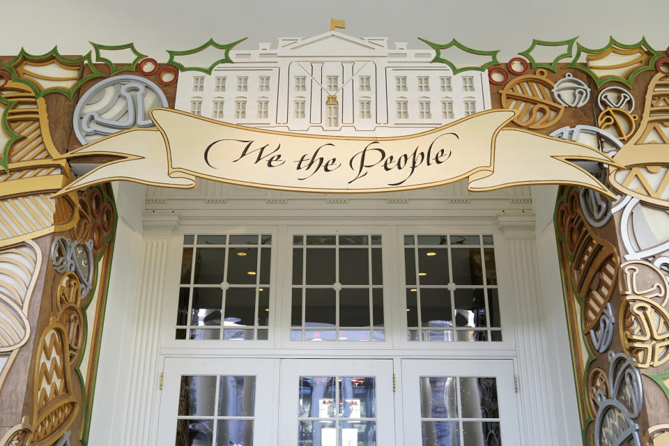 The entrance to the East Wing of the White House is decorated for the holiday season during a press preview of holiday decorations at the White House, Monday, Nov. 28, 2022, in Washington. (AP Photo/Patrick Semansky)