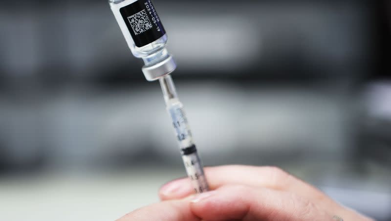 A COVID-19 vaccine is drawn at Salt Lake County Health Center in Salt Lake City on Wednesday, Oct. 4, 2023. As RSV, COVID-19 and flu cases increase nationwide, vaccine uptake remains low. officials say.