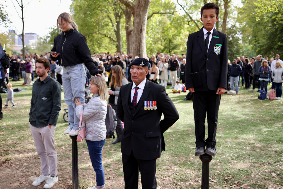 Mourners wait following two minutes of silence during the state funeral and burial of Britain’s Queen Elizabeth II in London on Sept. 19, 2022.<span class="copyright">Kevin Coombs—Reuters</span>