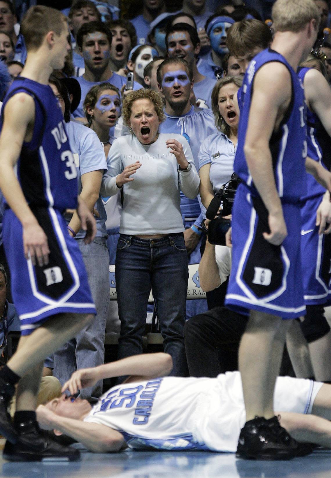 UNC fans react after a flagrant foul by Duke’s Gerald Henderson (not pictured) knocked down UNC’s Tyler Hansbrough late during the second half of a March 4, 2007 game in Chapel Hill. Duke’s Henderson was ejected from the game. UNC won, 86-72. Ted Richardson/File photo