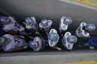 Detroit Lions players wait in the tunnel to be introduced before an NFL football game against the Green Bay Packers Sunday, Sept. 20, 2020, in Green Bay, Wis. (AP Photo/Morry Gash)