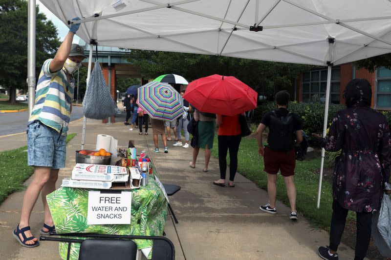 Voters line up to cast their ballots in Atlanta