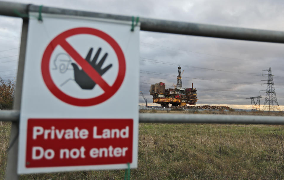 An old decommissioned oil platform sits on land where it is being demolished in Hartlepool, England, Monday, Nov. 11, 2019. Britain's political parties are battling to win Hartlepool and places like it: working-class former industrial towns whose voters could hold the key to 10 Downing Street, the prime minister's office. Once-bustling shipyards are closed, though rusting hulks are reduced to scrap at a site just outside town. Most of the steelworks that once employed thousands shut down in the 1970s and 1980s. (AP Photo/Frank Augstein)