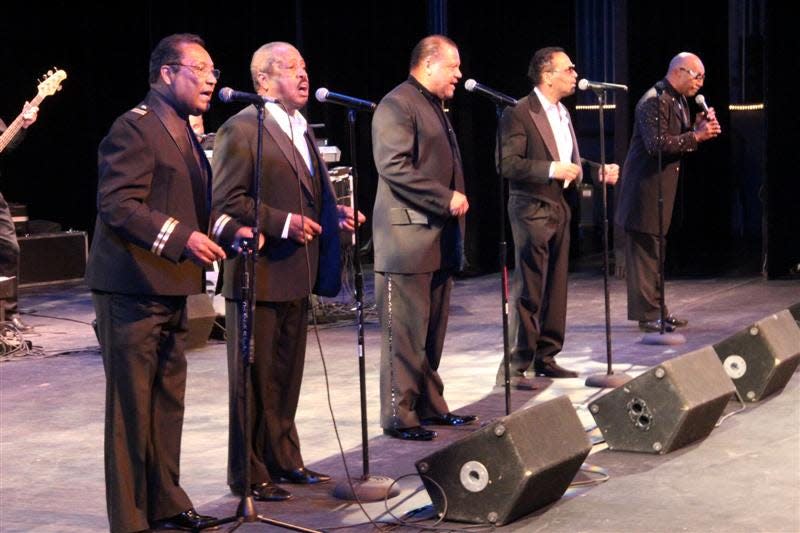 From left to right, Ralph, Pooch, Tiny, Butch and Chubby Tavares entertain a full house in this Standard Times file photo.