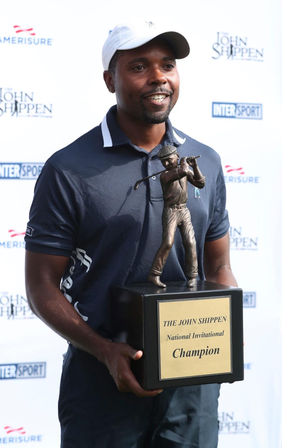 Tournament winner Wyatt Worthington II holds the trophy after final-round action of the 2022 John Shippen National Invitational at the Detroit Golf Club on Sunday, July 24, 2022.