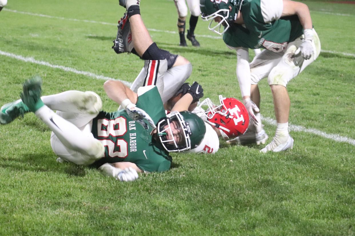 Oak Harbor's Hayden Buhro makes a tackle.