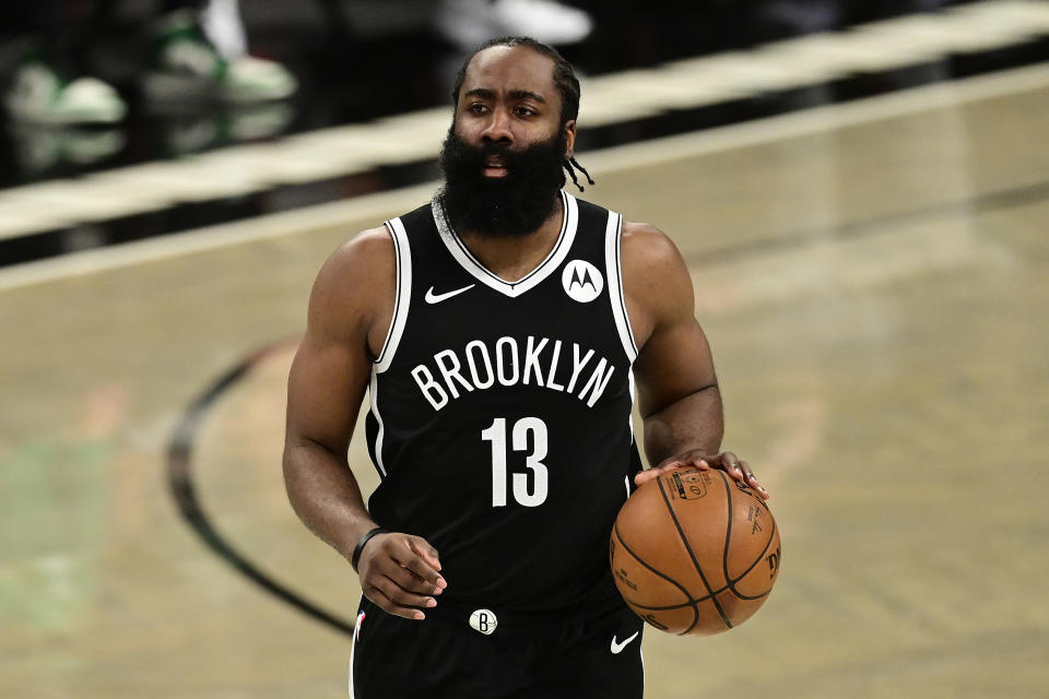 NEW YORK, NEW YORK - MAY 22:  James Harden #13 of the Brooklyn Nets handles the ball against the Boston Celtics in Game One of the First Round of the 2021 NBA Playoffs at Barclays Center at Barclays Center on May 22, 2021 in New York City. NOTE TO USER: User expressly acknowledges and agrees that, by downloading and or using this photograph, User is consenting to the terms and conditions of the Getty Images License Agreement.  (Photo by Steven Ryan/Getty Images)