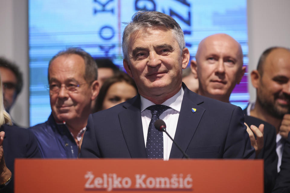 Zeljko Komsic of Democratic Front Party (DF) smiles at a news conference where he declared himself the winner of the Croat seat of the tripartite Bosnian Presidency in Sarajevo, Bosnia, Sunday, Oct. 2, 2022. (AP Photo/Armin Durgut)