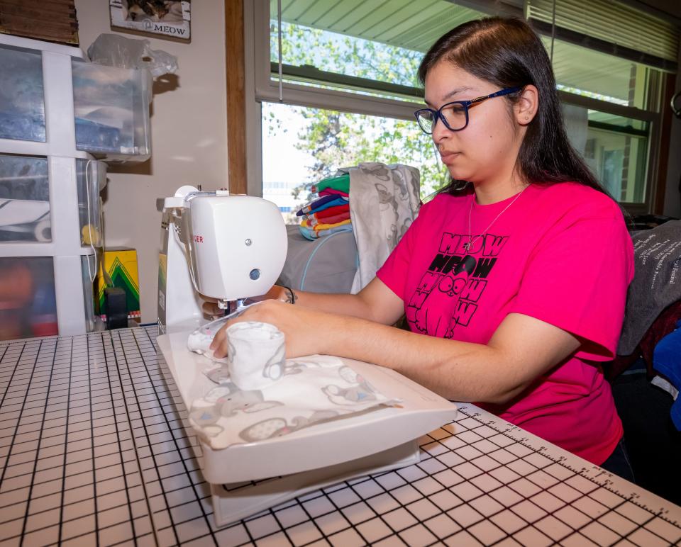 Natalie Stremlau of Oak Creek is pictured at her workstation in her home, Sunday, May 21, 2023.