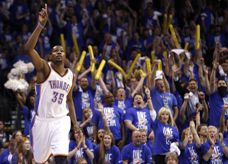 Oklahoma City Thunder forward Kevin Durant reacts after hitting a basket against the Los Angeles Lakers in the third quarter of Game 1 in the second round of the NBA basketball playoffs, in Oklahoma City, Monday, May 14, 2012. (AP Photo/Sue Ogrocki)