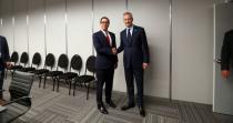 U.S. Secretary of the Treasury Steven Mnuchin and France's Finance Minister Bruno Le Maire shake hands at the G20 Meeting of Finance Ministers in Buenos Aires, Argentina, July 21, 2018. REUTERS/Marcos Brindicci