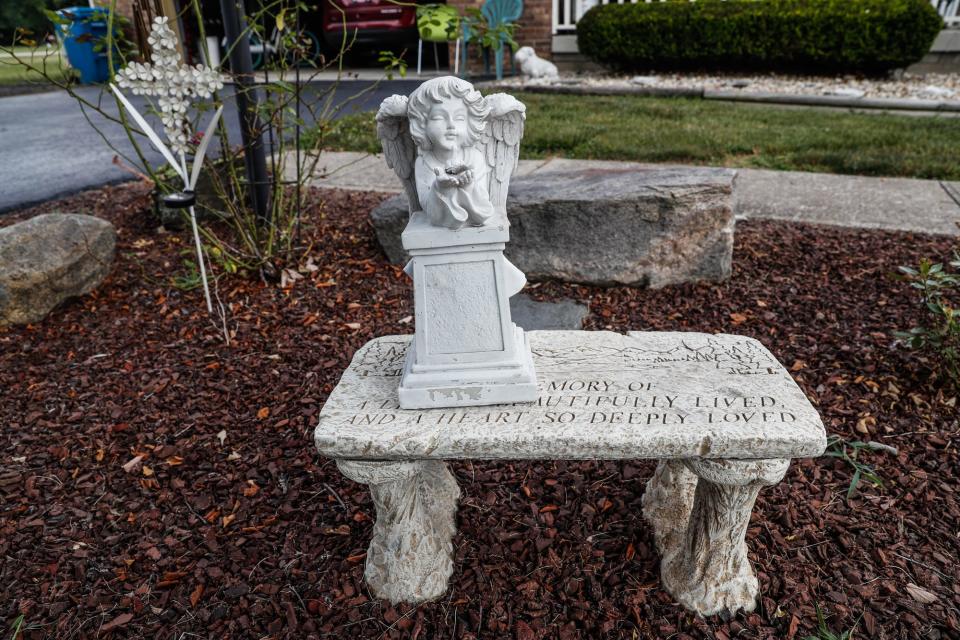 A memorial garden for Jill Phipps is seen at the home of her parents, Thomas and Brenda Limbach, on Thursday, Aug. 19, 2021, in Indianapolis. Phipps was shot and killed by her husband after red flag gun laws failed to protect her.