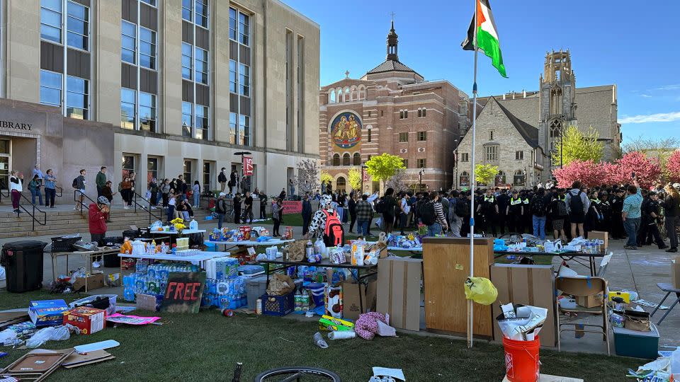 Police start removing tents erected by protesters on the University of Wisconsin, Madison campus on Wednesday, May 1.  - Todd Richmond/AP