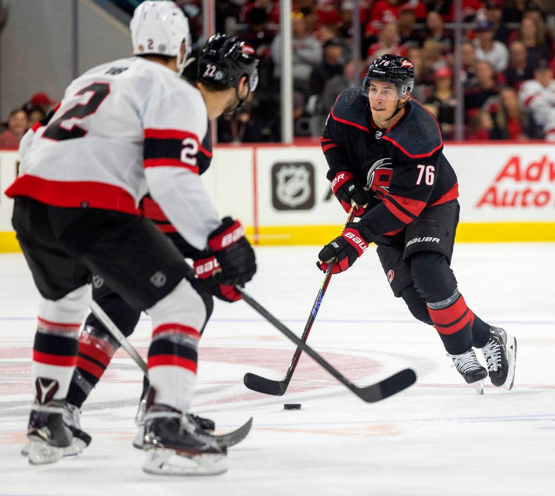 The Carolina Hurricanes Brady Skjei (76) moves the puck up the ice against the Ottawa Senators on Wednesday, October 11, 2023 at PNC Arena, in Raleigh N.C Robert Willett/rwillett@newsobserver.com