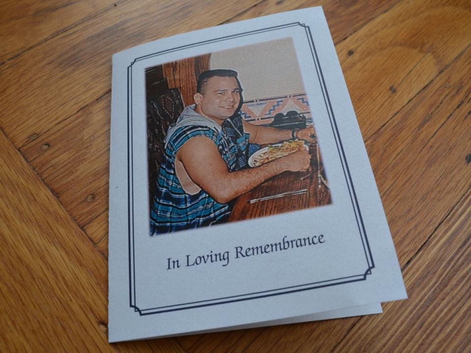 A memorial program for Michael Flores, who died in November after entering Inside Safe (Josh Marcus / The Independent)