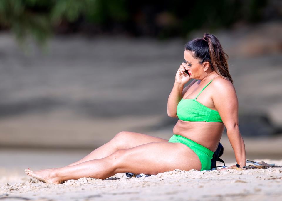 MAFS bride Mishel Meshes cools off in the Sydney heat by taking a dip in a lime green bikini. Photo: DIIMEX.