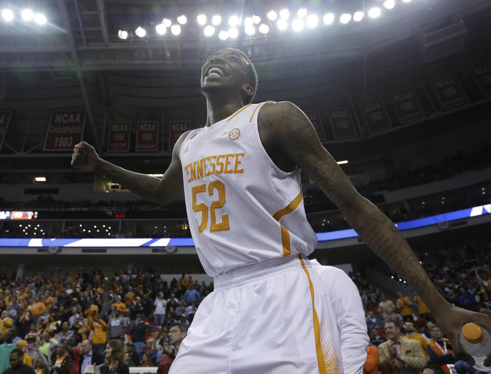 Tennessee guard Jordan McRae (52) celebrates after the second half of an NCAA college basketball third-round tournament game against Mercer , Sunday, March 23, 2014, in Raleigh. Tennessee won 83-73. (AP Photo/Gerry Broome)