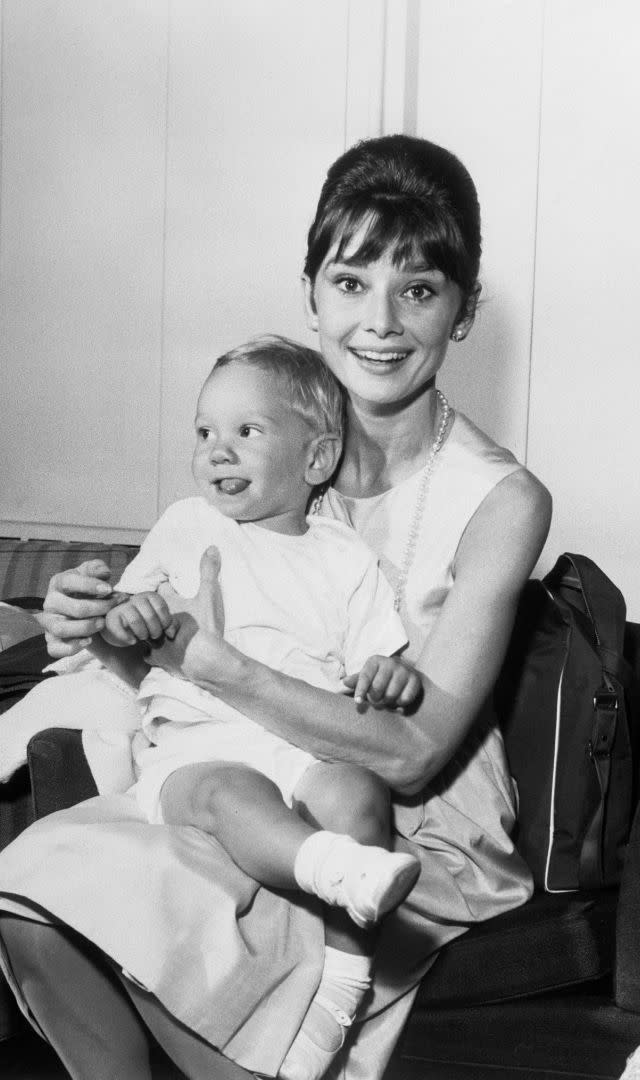 (Original Caption) One of Hollywood’s brightest stars, Audrey Hepburn has a joyful reunion with her son Sean, three years old, upon his arrival from Los Angeles via TWA SuperJet at Idlewild Airport. Miss Hepburn just completed two motion pictures. Breakfast at Tiffany’s and The Children’s Hour.