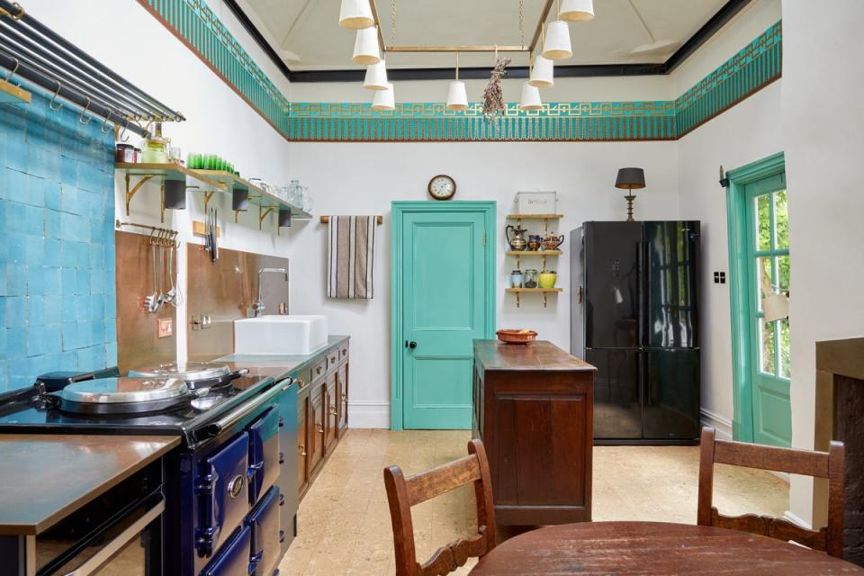 The double-height kitchen is a legacy of the building’s former life as a school (Inigo)