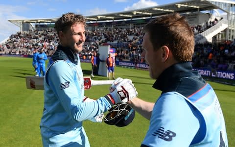 Eoin Morgan (right) congratulates Joe Root (left) on his match-winning century - Credit: getty images