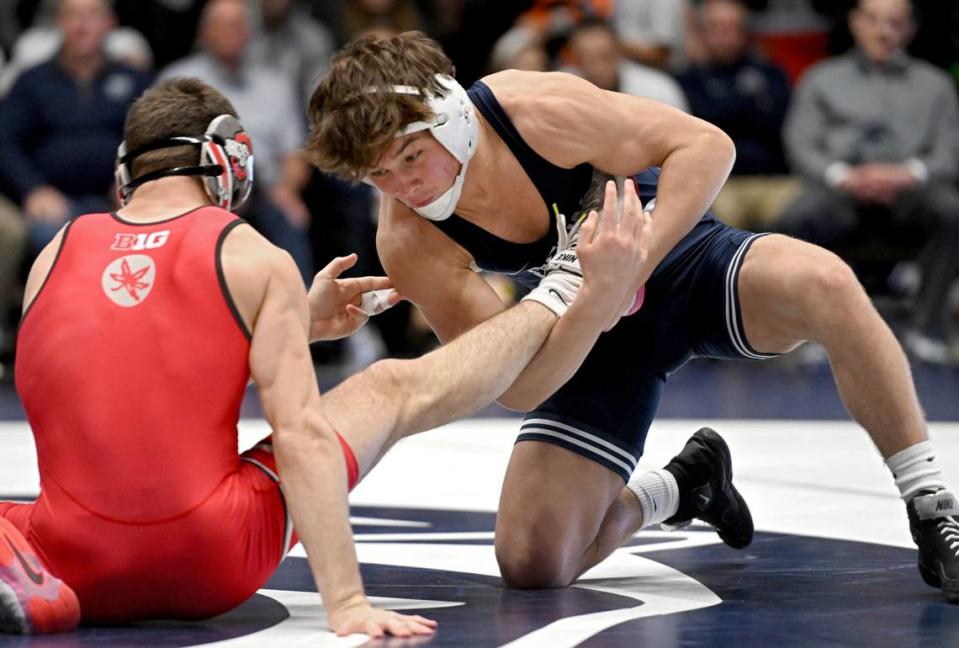 Penn State’s Tyler Kasak wrestles Ohio State’s Dylan D’Emilio in the 149 lb bout during the match on Friday, Feb. 2, 2024 in Rec Hall.