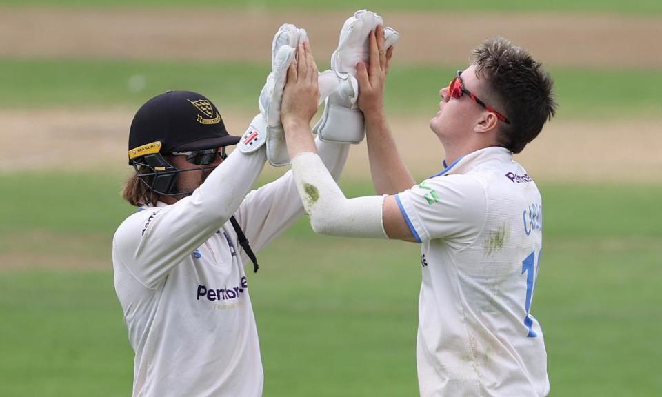 Jack Carson (right) celebrates a wicket for Sussex against Glamorgan in June