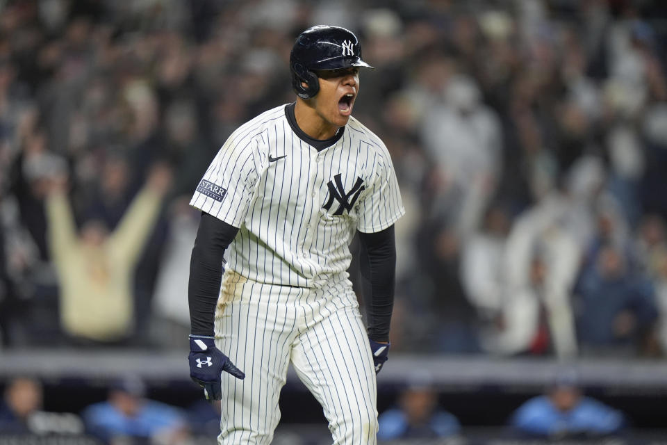 New York Yankees' Juan Soto celebrates after hitting a three-run home run during the seventh inning of a baseball game against the Tampa Bay Rays, Friday, April 19, 2024, in New York. (AP Photo/Frank Franklin II)