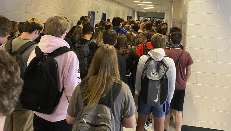 Students crowd a hallway at North Paulding High School in Dallas, Georgia, on August 4, 2020. / Credit: Twitter via AP